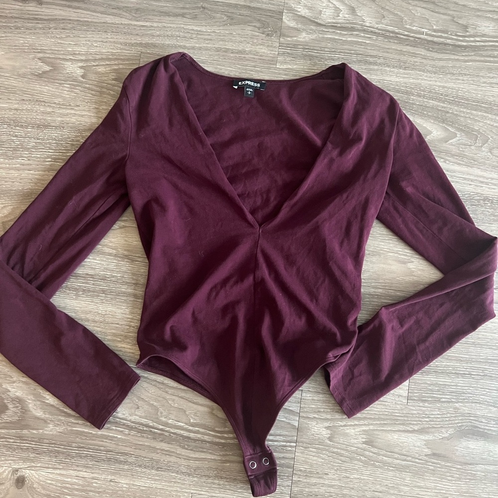 Express long sleeve deep v-cut body suit in dark purple